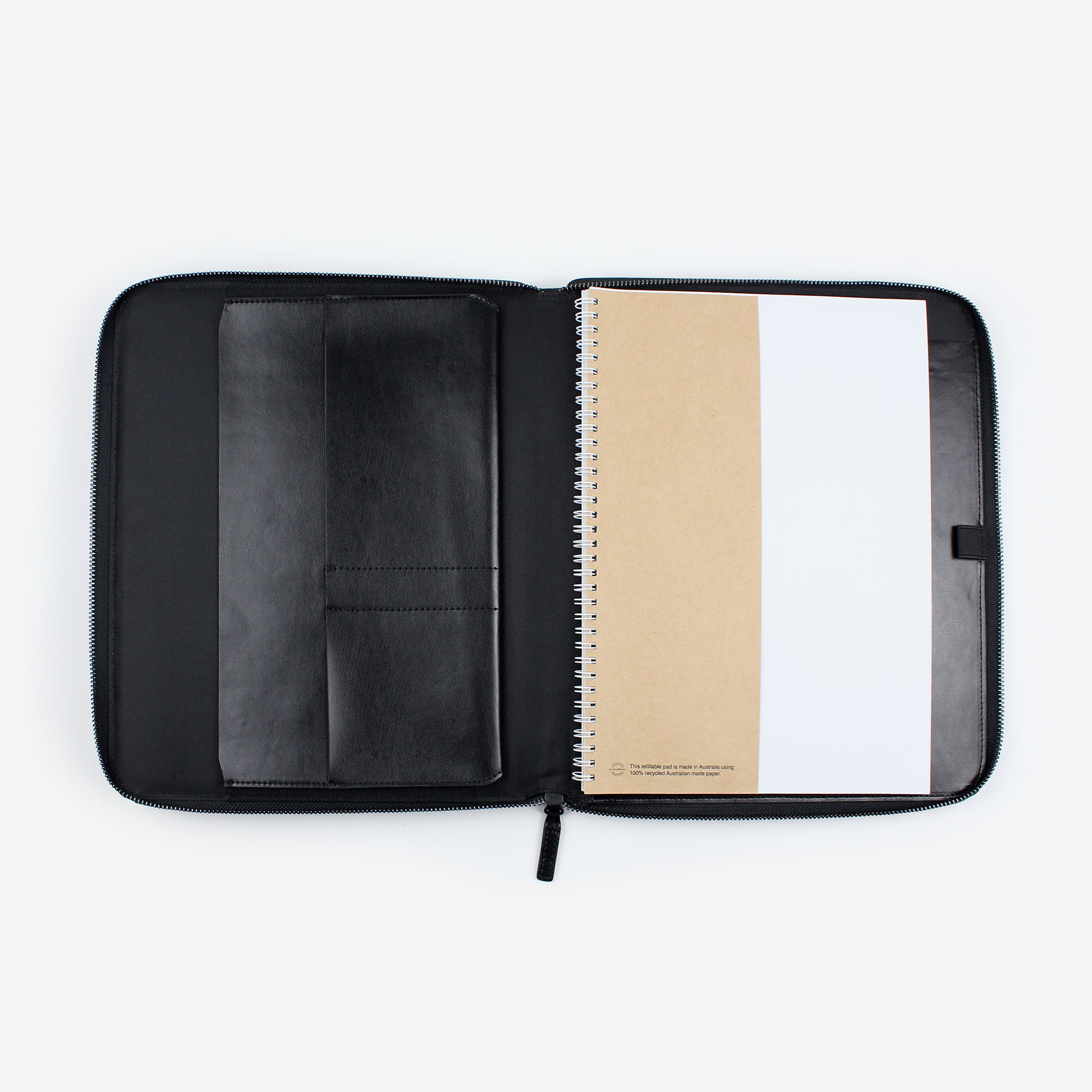 Open black A4 leather compendium with internal pockets and pen loop.